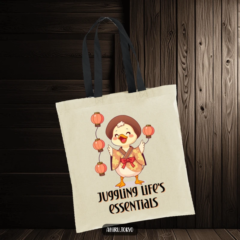 Funny Juggling Duck Tote Bag: A smiling duck in a vibrant kimono juggles small lanterns, a perfect, humorous accessory for daily errands.